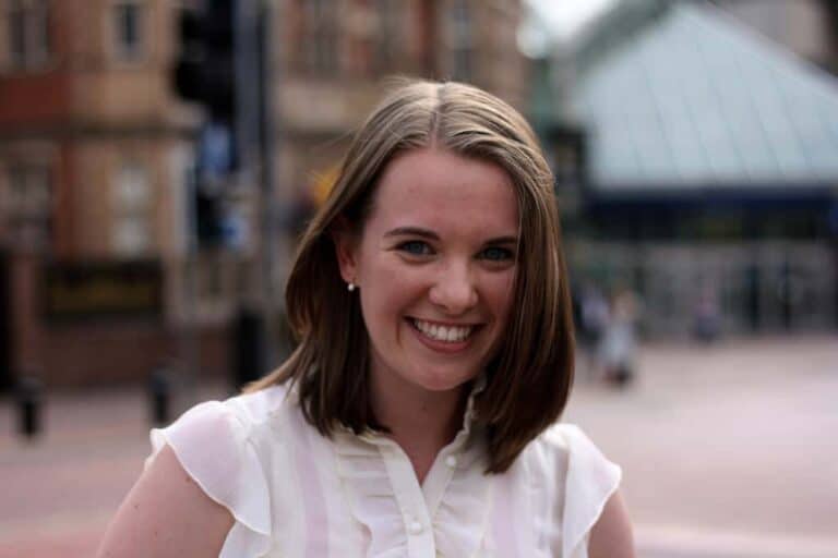 woman smiling outside