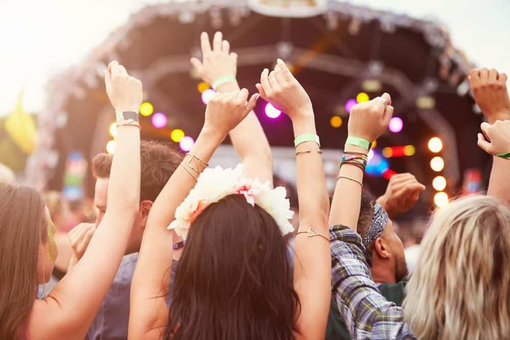 10 Mistakes Music Festival Newbies Make and How to Avoid Them 3 hands up music festival