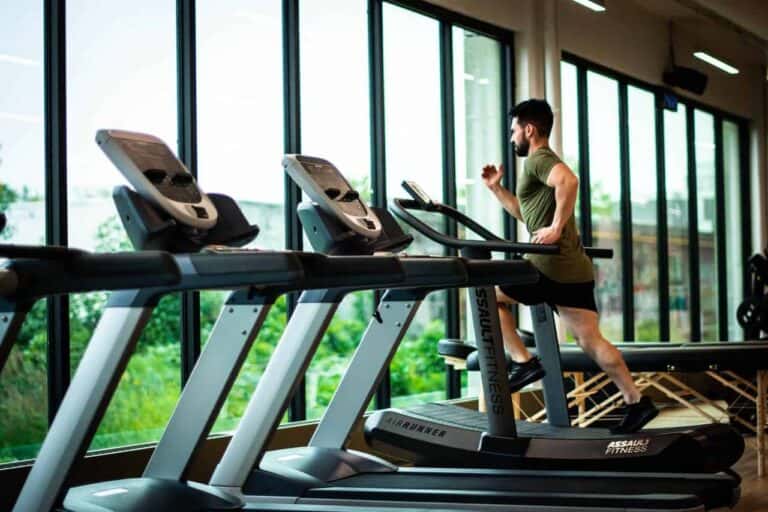 man exercising treadmill