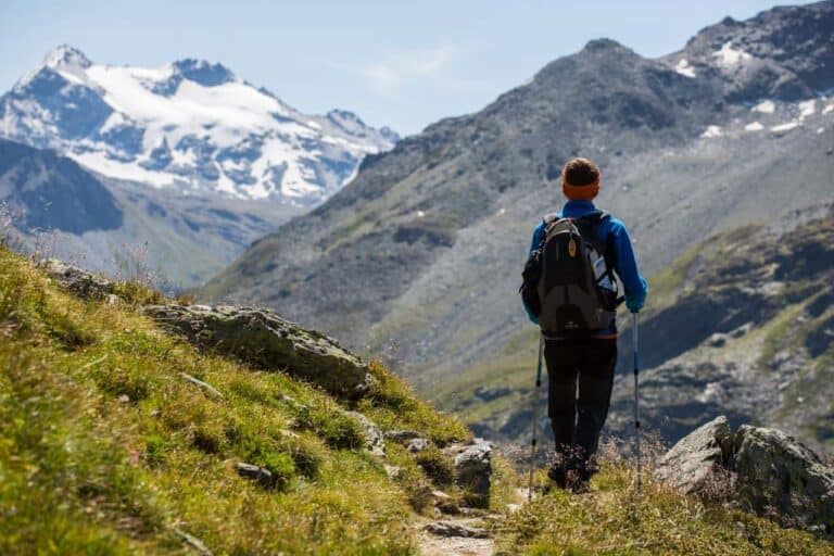 man hiking beautiful mountains