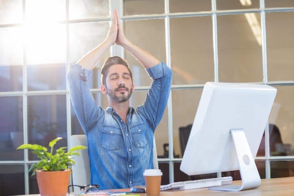 7 Ways to Sneak Workouts into Your Work Day 2 nerd doing yoga