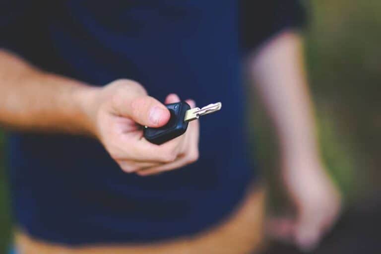 father handing keys away