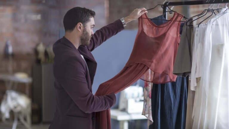 man holding womens dress