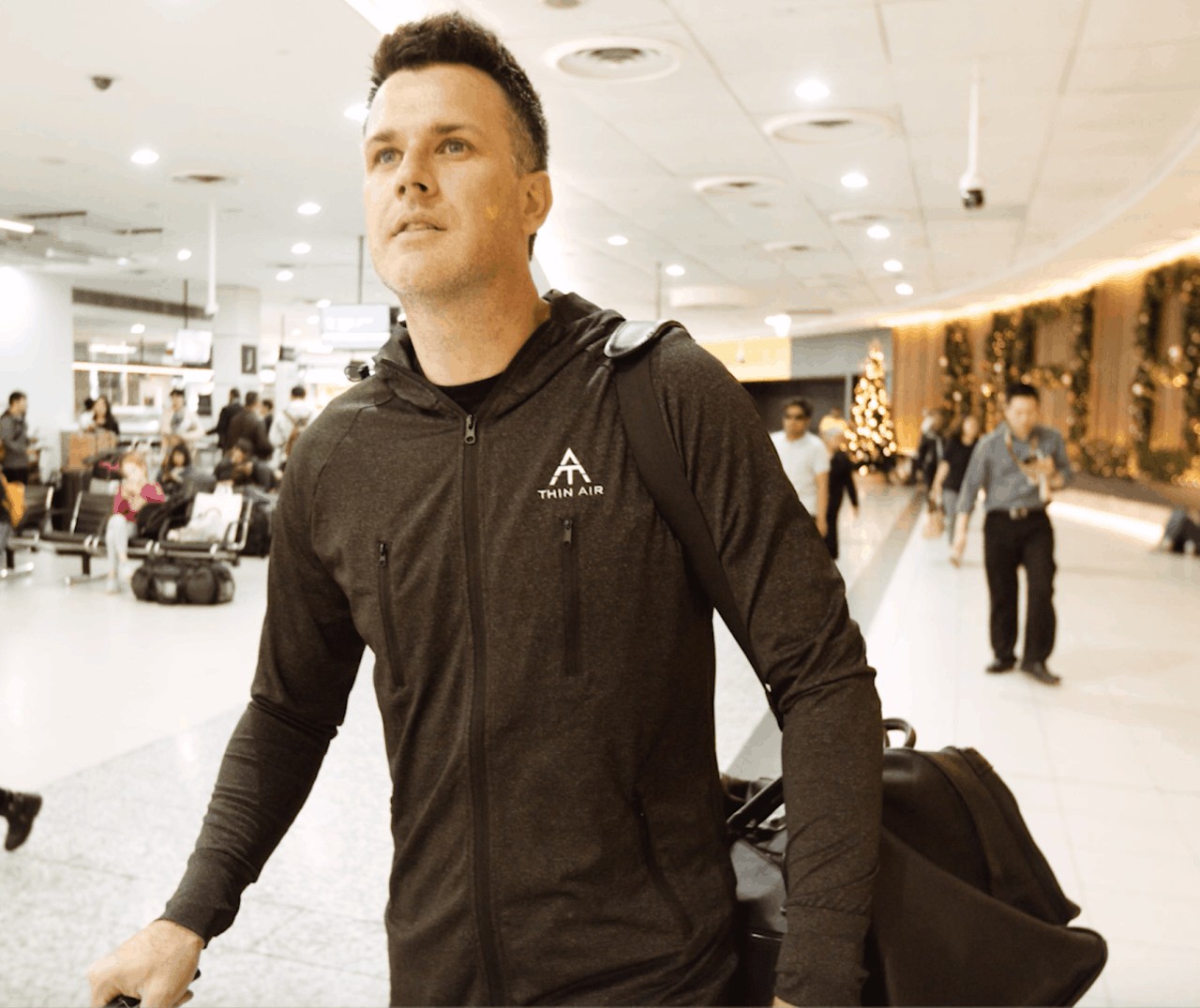 Travel Garments - Thin Air Flite Jacket 2 man wearing thin air flite jacket airport