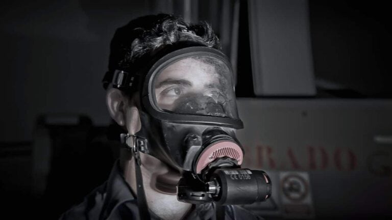 person wearing gas mask