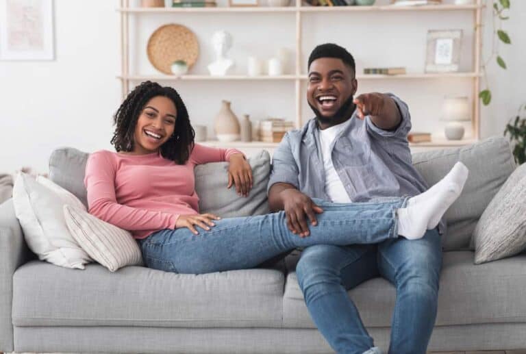black couple on couch