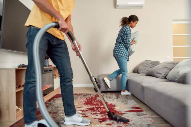 couple cleaning mess
