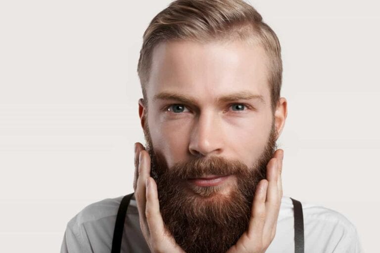 happy man touching his beard