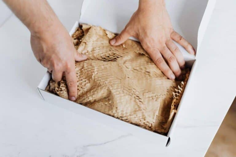 person packing box