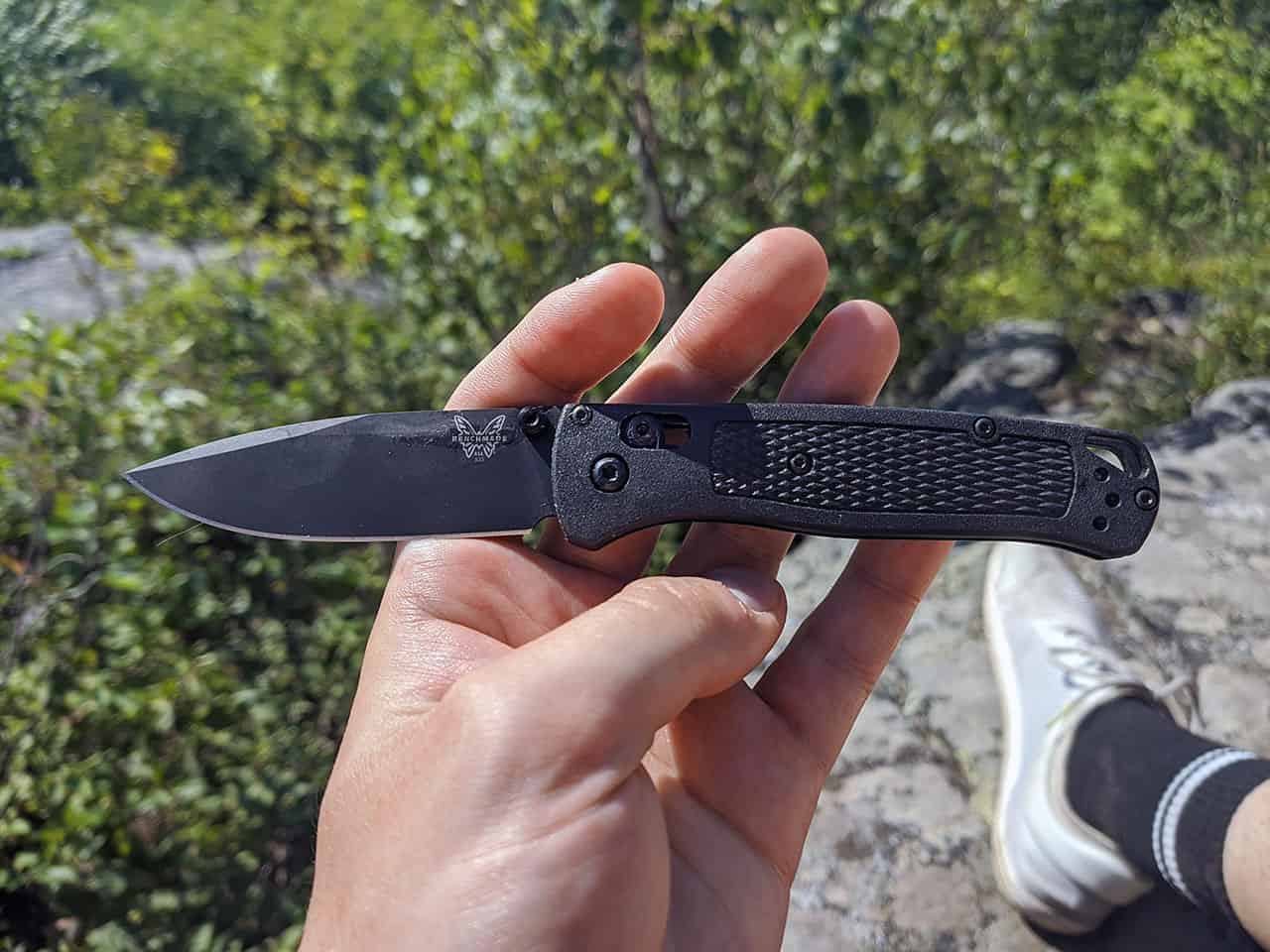 Benchmade 535BK-2 BUGOUT Review: A Versatile and Intimidating Tool 5 benchmade knife in forest