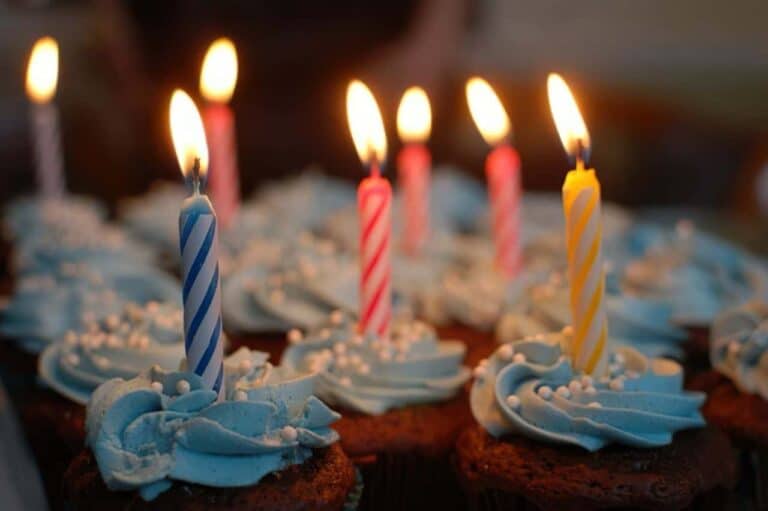 birthday cake and candles burning