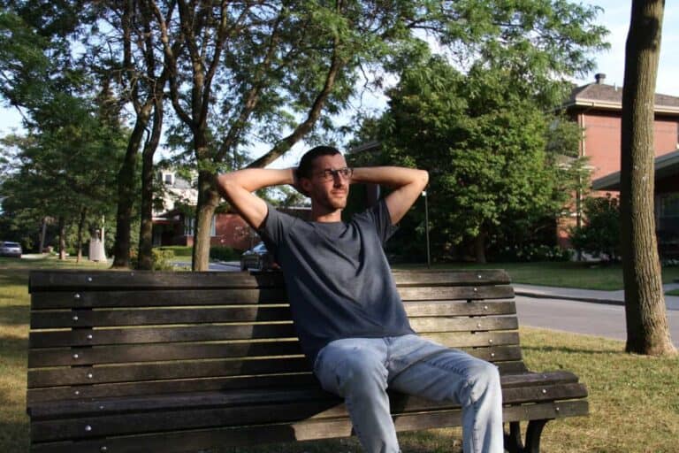 the social tee man on bench