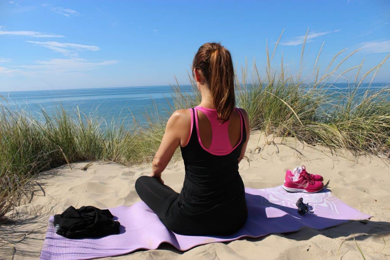 meditation yoga woman girl sand beach exercise enlarged