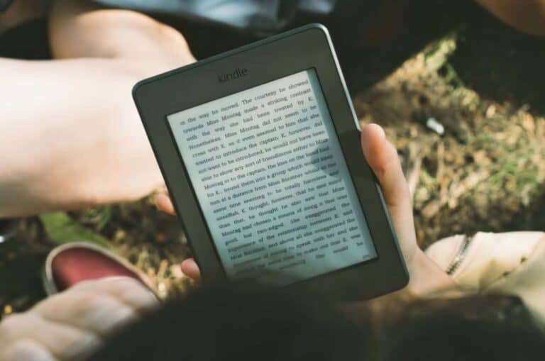 person holding kindle covers with lights
