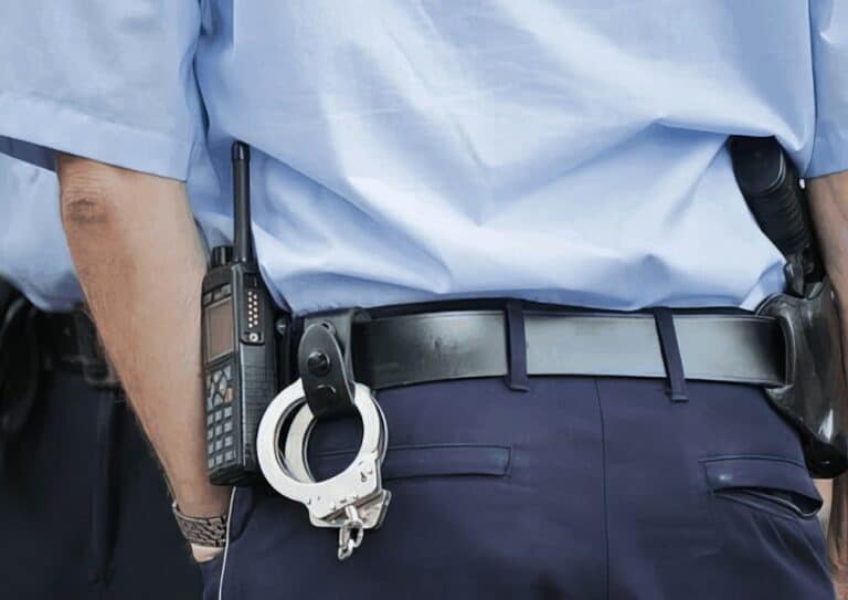 police man with handcuffs