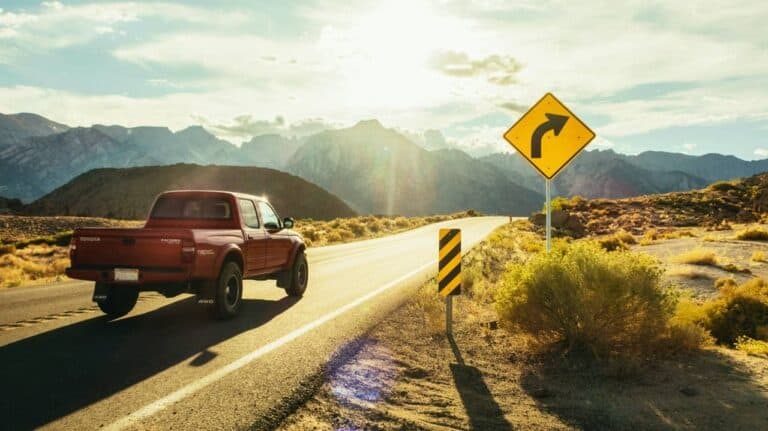 pickup truck driving in the desert