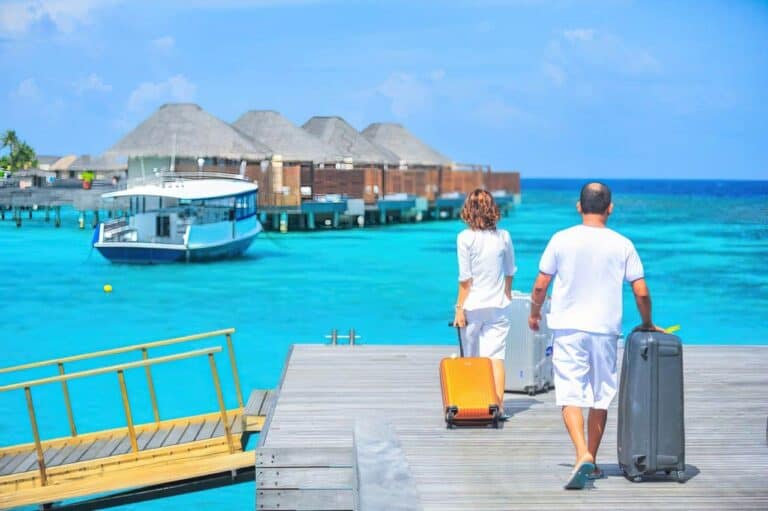 people dragging luggage on dock upscaled