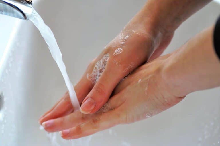 person washing hands