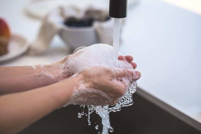 person washing their hands