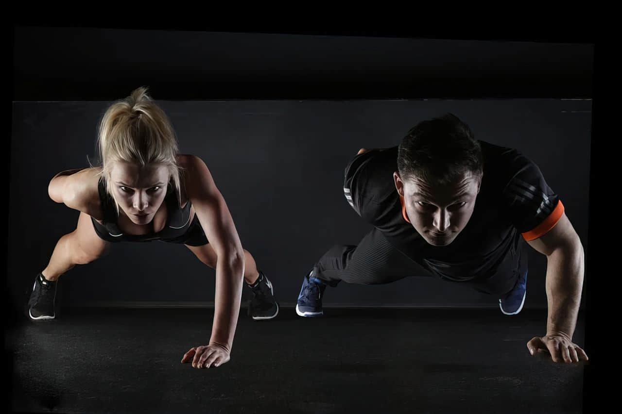 Here's How to Handle Emotional Trauma: The Healthy Way 2 people doing one arm pushups