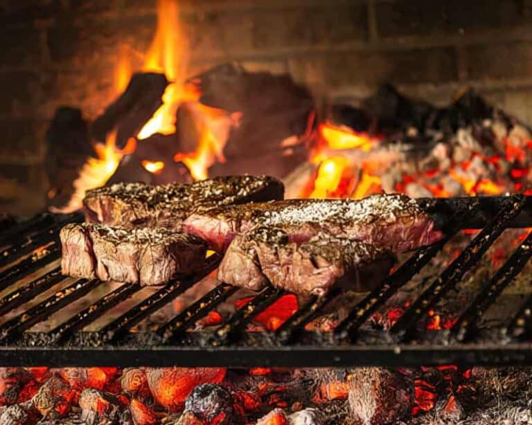 steaks on a grill