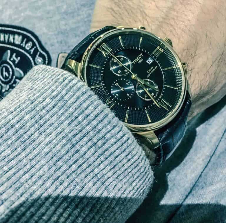 man wearing tissot watch