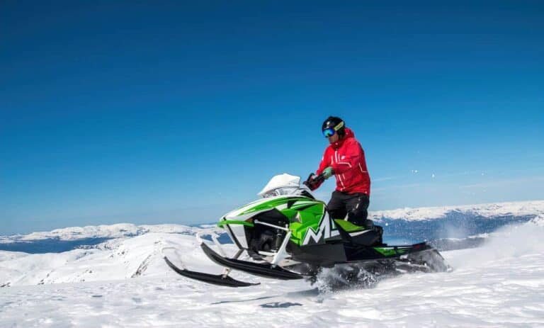 person on snowmobile