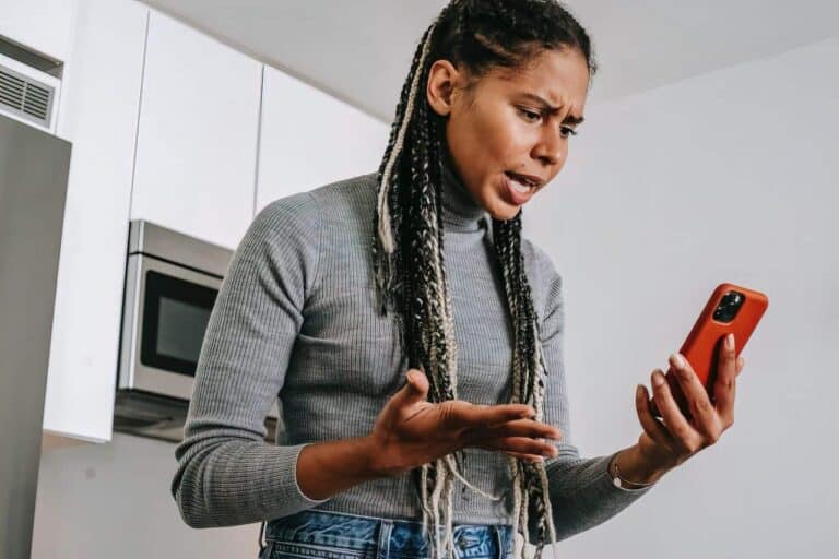 scared woman on phone