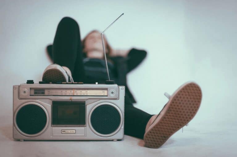 person listening to radio