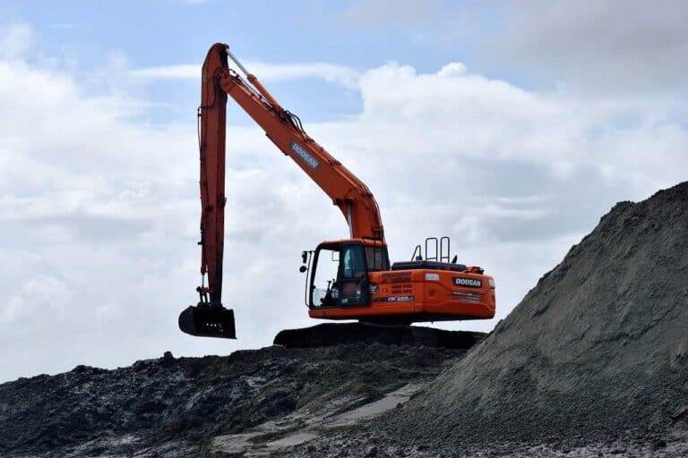 backhoe digging dirt