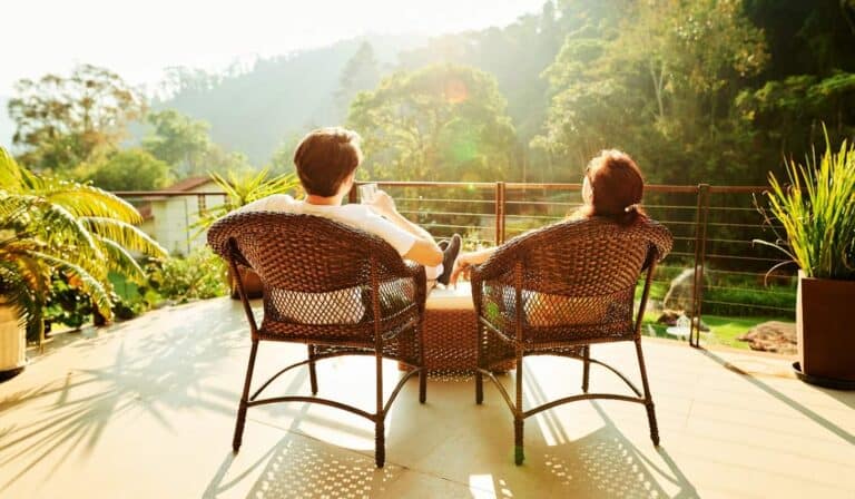 two people sitting in accent chairs
