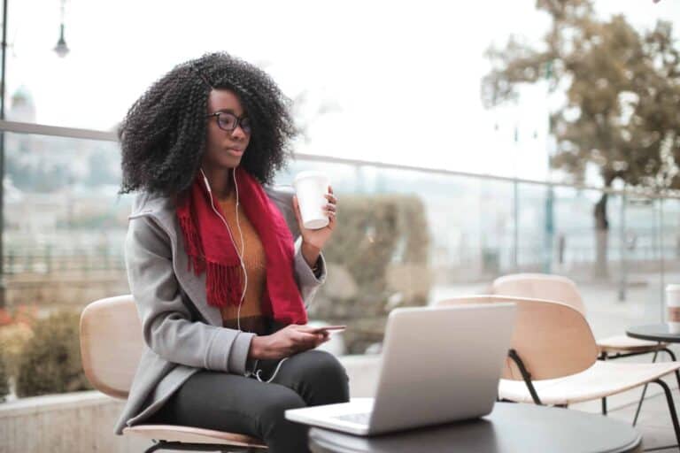woman using notebook computer sitting