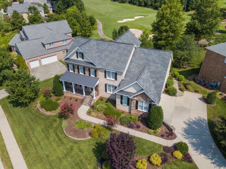 house on green lawn