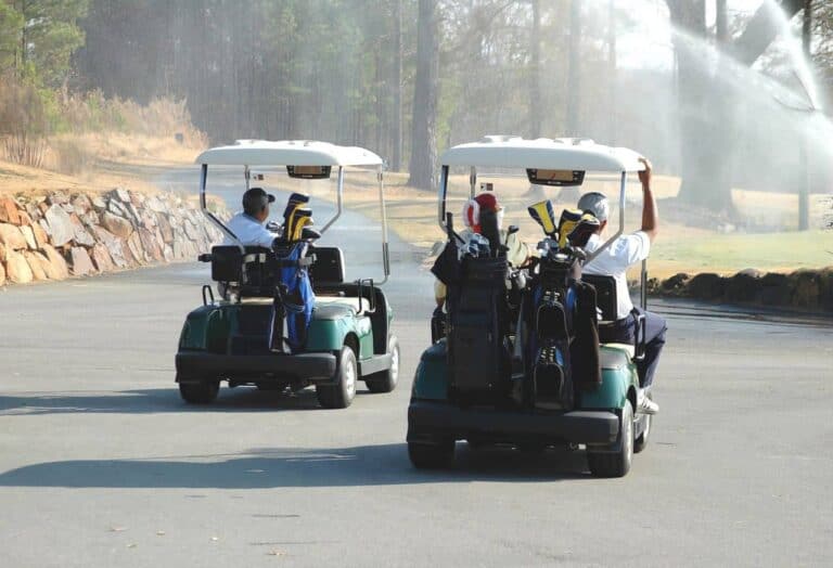 people driving golf carts