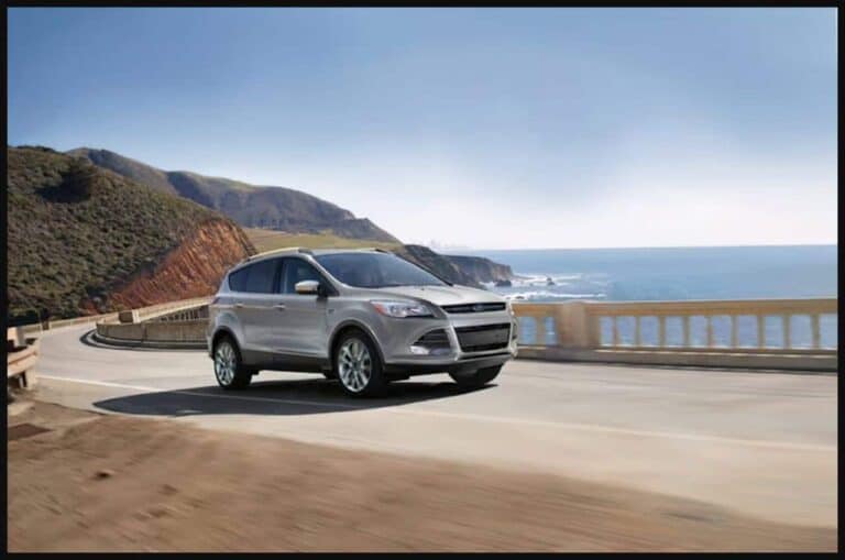 car driving along near waterfront