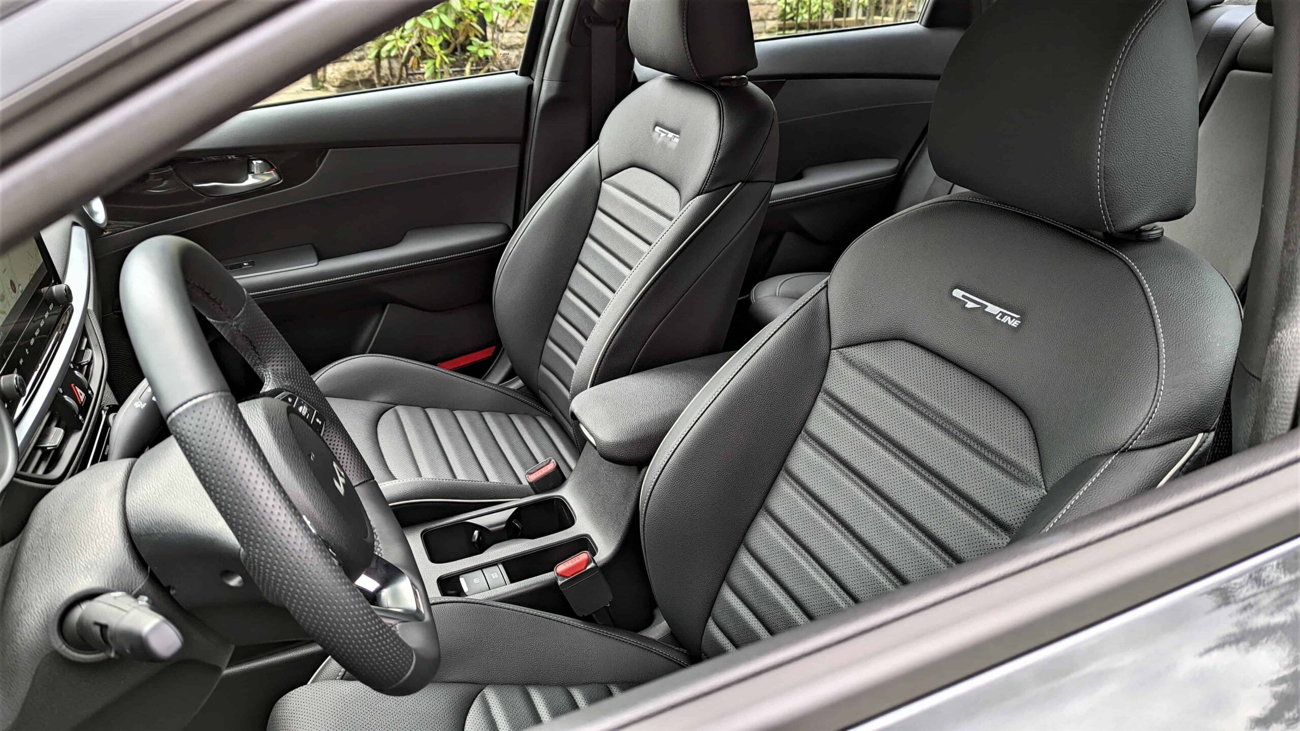 Small, Fun, and Fuel Efficient: 2022 Kia Forte GT-Line Review 10 2022 Kia Forte GT Line front seats scaled