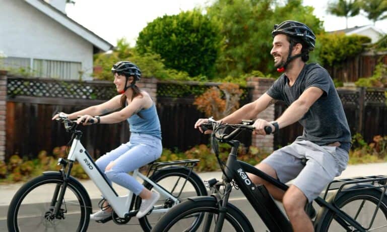 couple biking electric bicycle