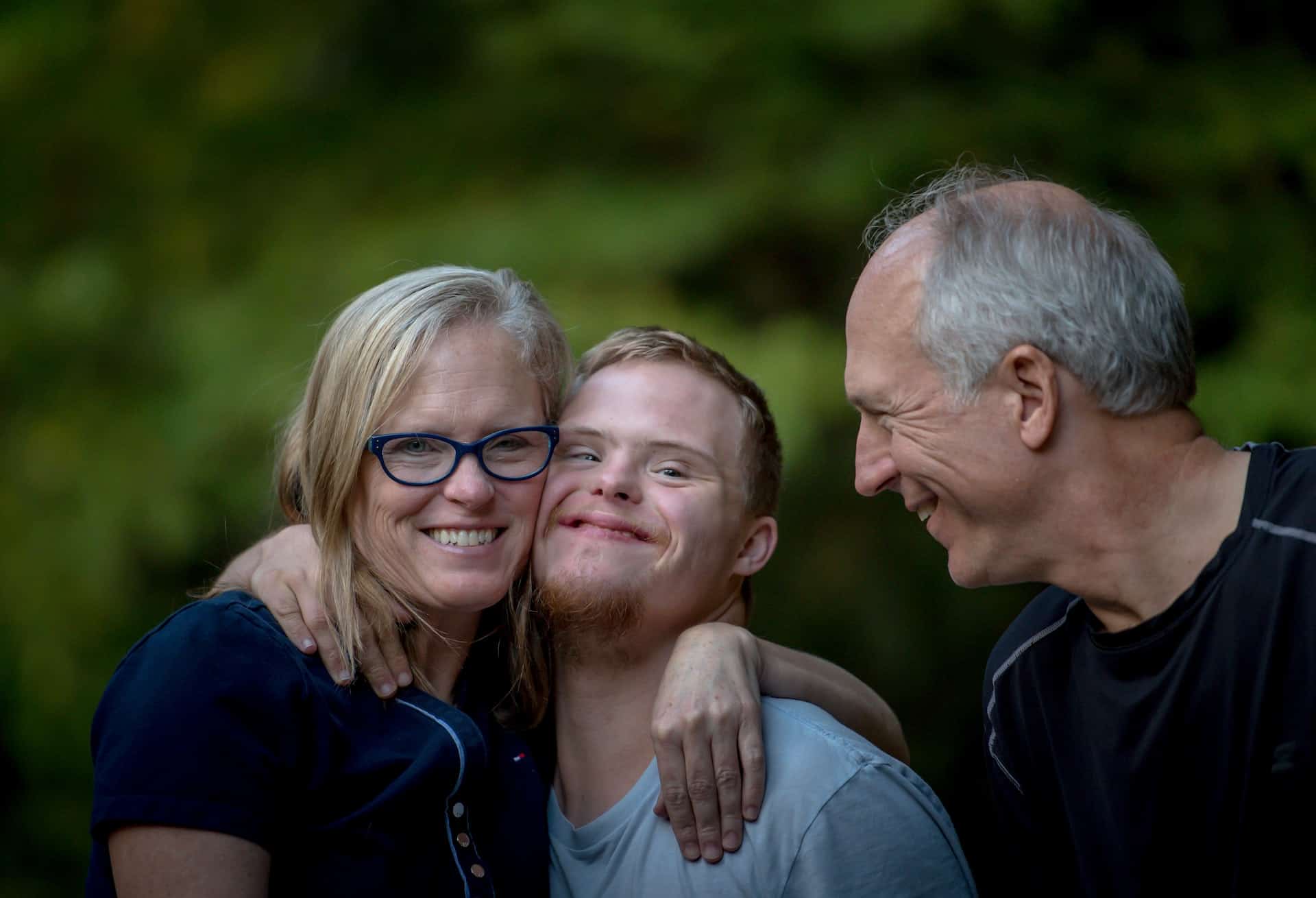 Down syndrome kid with parents