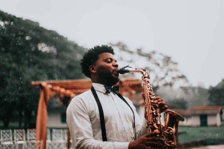 man playing saxophone jazz music