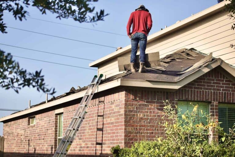 roofing work man on ladder