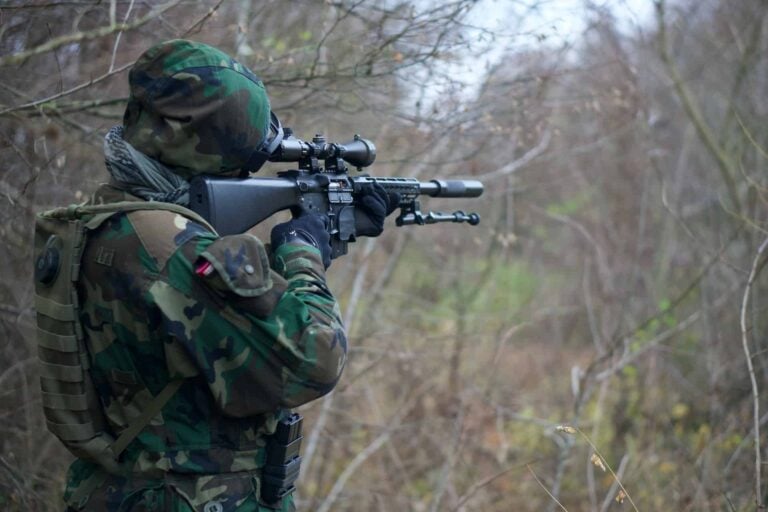 gun with scope and silencer