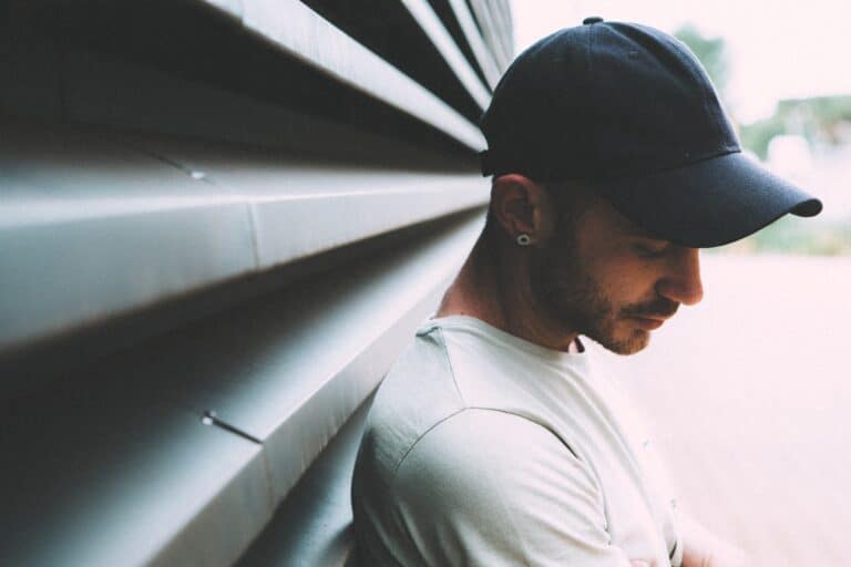 Man wearing baseball cap