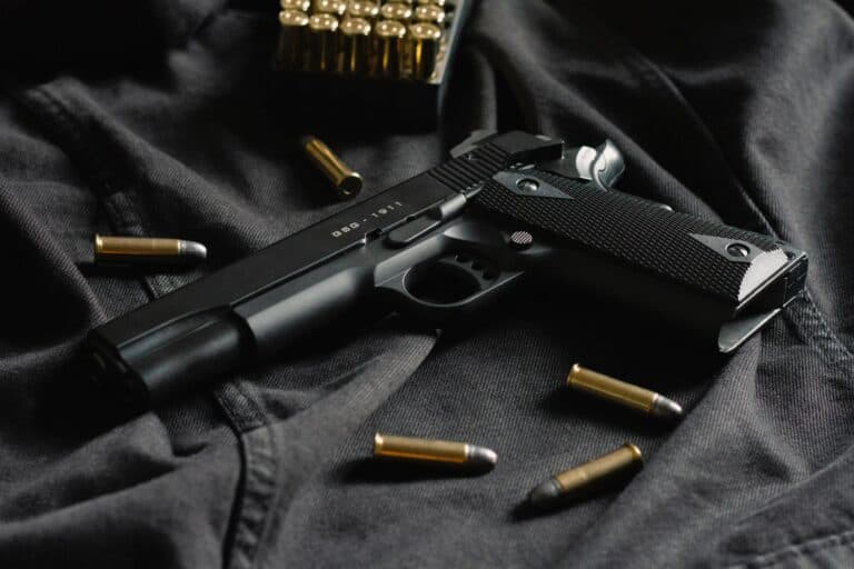 1911 handgun with bullets