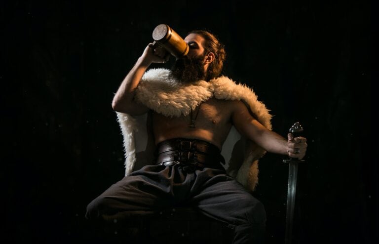 Viking Man with sword drinking