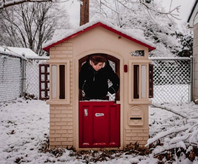 kids playing in playhouse