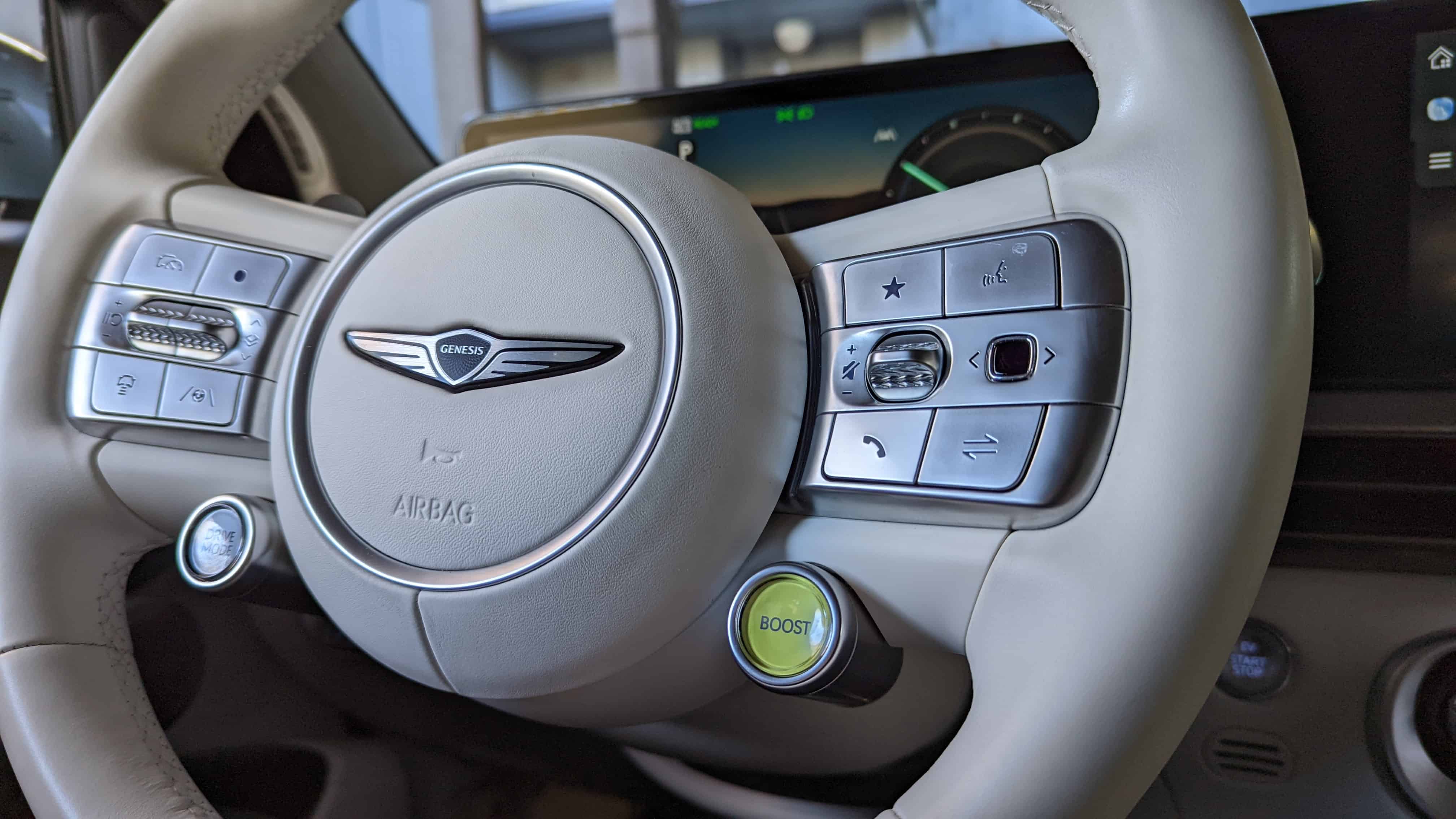 2023 Genesis GV60 Review: E-GMP-Based Luxury CUV 12 2023 Genesis GV60 steering wheel boost button