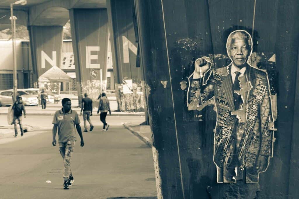 Unraveling South Africa’s Treasures: A Journey Through the Rainbow Nation 2 Nelson Mandela poster Johannesburg street south africa