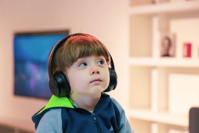 cute autistic child with headphones