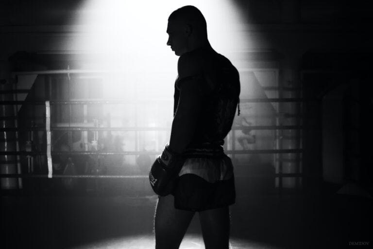 dramatic image of man in muay thai ring