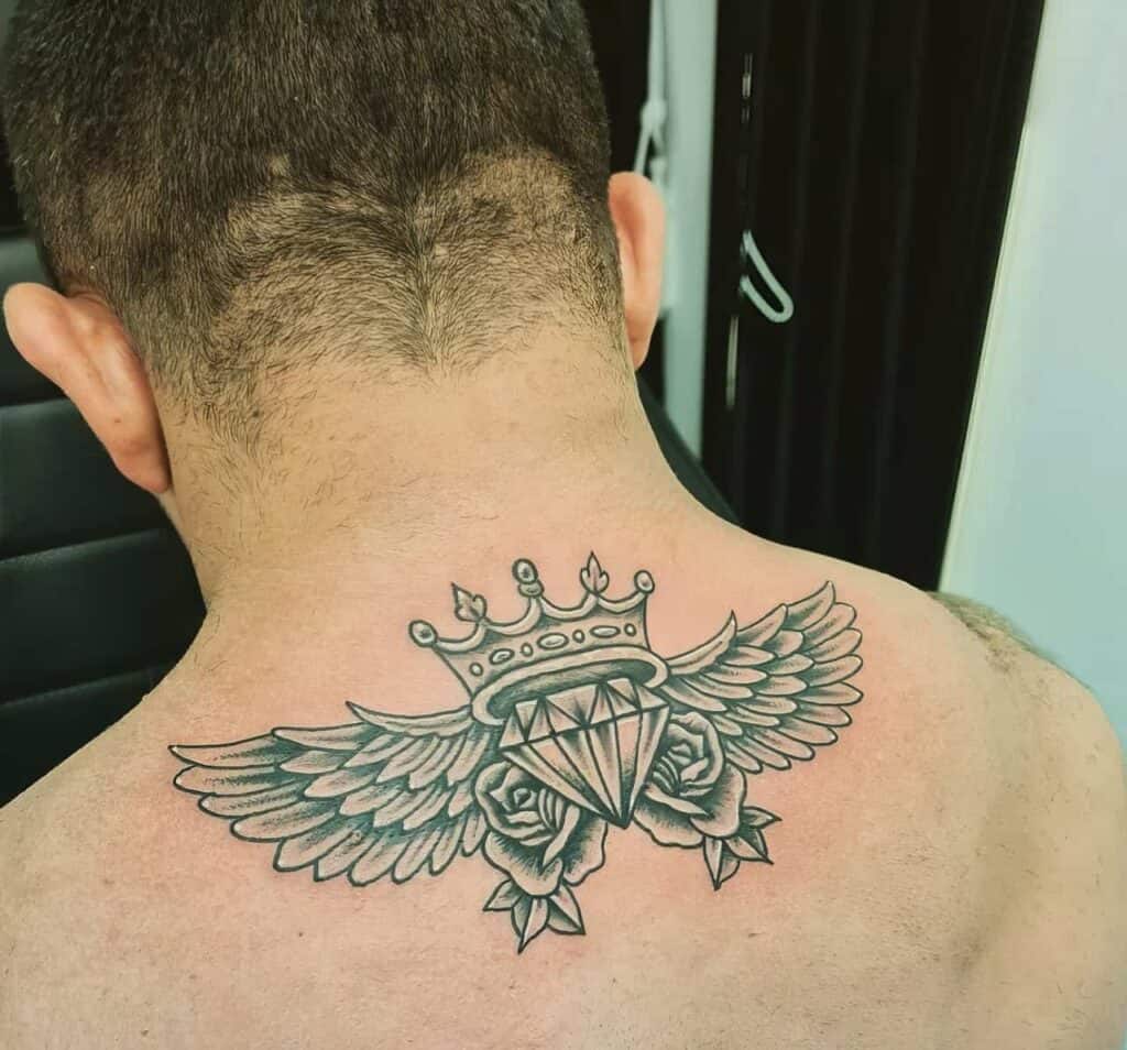 The Ultimate Guide to Crown Tattoos for Men: Design Ideas, Symbolism, and Inspiration in 2023 22 mens crown tattoo 13